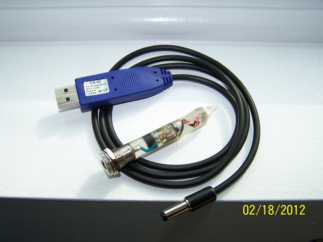 This is the cable and a level converter I made.  Most older cell phones used 3.3 volt TTL and the engine computer uses 5 volt TTL so a converter is needed.  The CA-42 cable is based on TTL to USB bridge PL2303.  Some versions of this chip are 5 volt tolerant, then no converter would be needed.  Not knowing which version of the chip was in the oversized USB plug.  I made the converter to be safe.