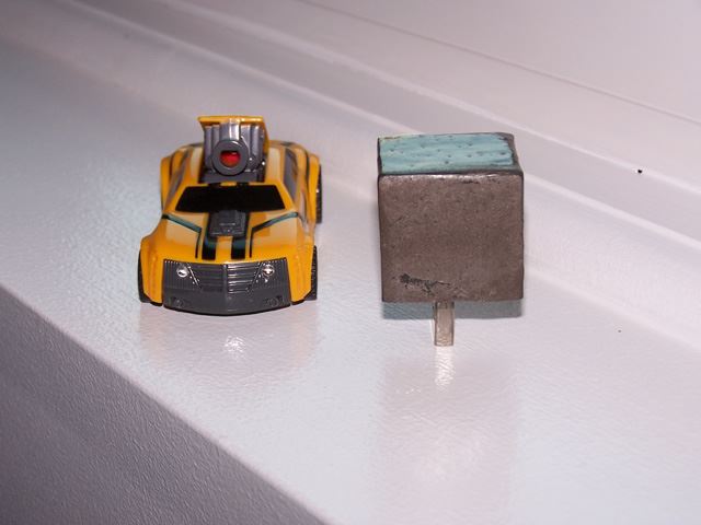 These are my two AllSparks.  The Cube is revision zero and the Camaro toy is revision one.  Both of these AllSparks will allow the BumbleBee Project car to run but the circuitry is slightly different.  More to follow...