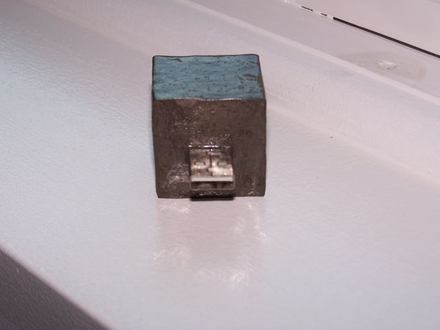 The circuitry is connected to this USB jack and is completely potted in clear jewlery casting resin.