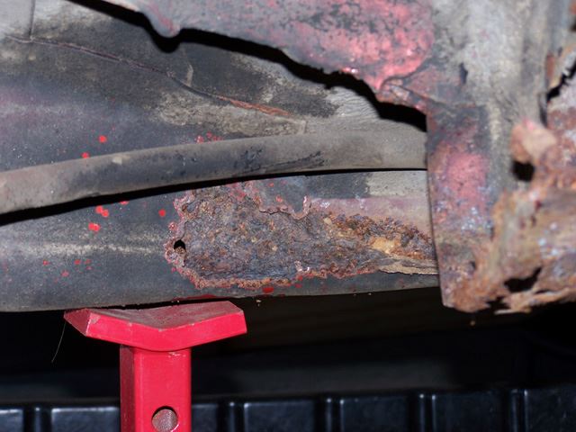This is another hole in the rear subframe.  It is near the end of the subframe under the rear passenger seat.