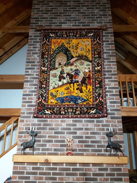 Our first project was to hang Mr. Powell's hand made rug art.