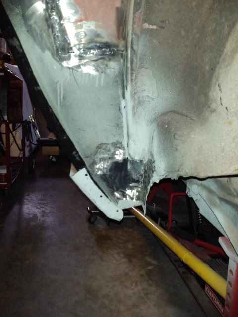 The rocker panel plug welds still need to be completed.