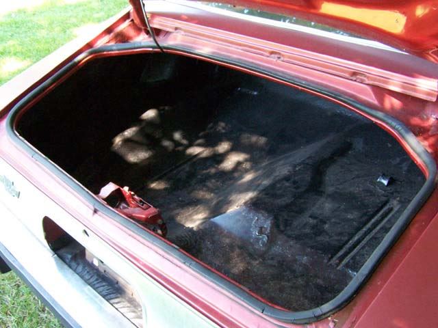 The driver's side trunk has some bubbles that might be rust.  Might need to hit the trunk paint to see what's under the bubbles.