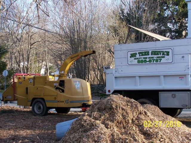 JSP Tree Service and Soupy's Cord Wood are highly recommended. The chipper is onsite and set up.