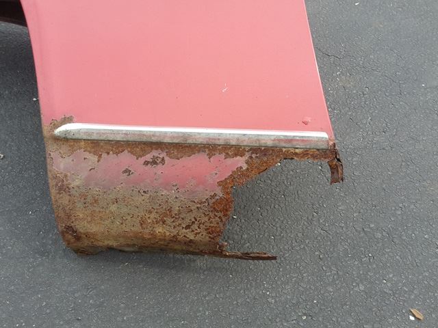 This is a close up of the large hole in the left fron fender.  Notice the inner fender bracing is also rotted away.  Lots of work to make it look right.