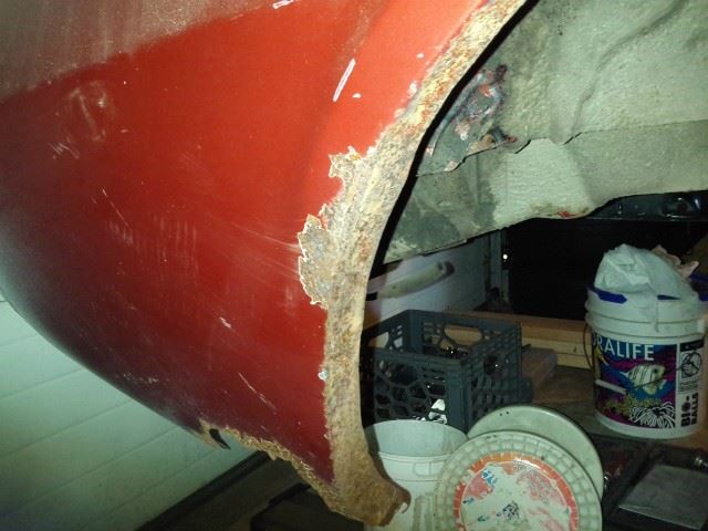 Rear of wheel well opening.  This is one of two spots with rot.  I might just patch this side instead of replacing the entire wheel well and quarter panel skin.