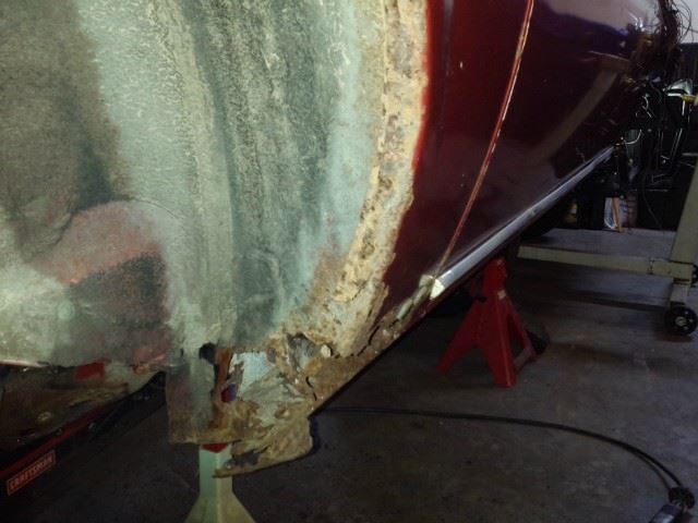 Front of the rear wheel well rot.  Two patches or the whole skin???
