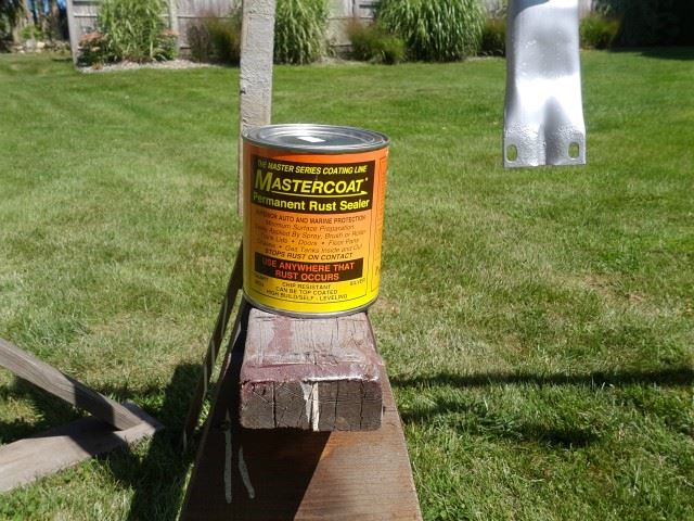 This is the primer I used.  When dry it completely seals the metal from oxygen, water, and chemicals.  As a primer the instructions call for two coats.