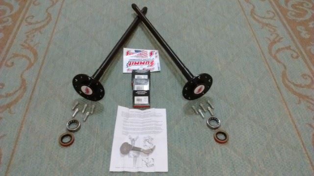 New axles, studs, seals, and bearings.  I also bought a pinion depth setting tool (center bottom).