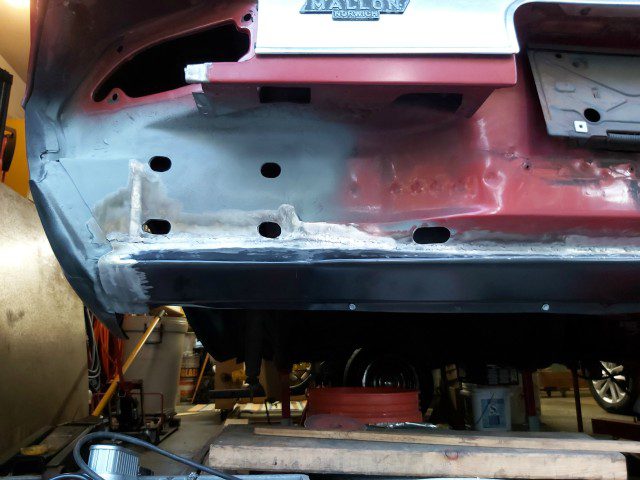 Driver side rear bumper area welded.  Still a little grinding left to blend the weld away.