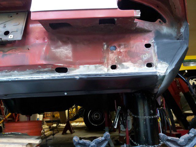 Passenger side rear bumper mount area and valance.