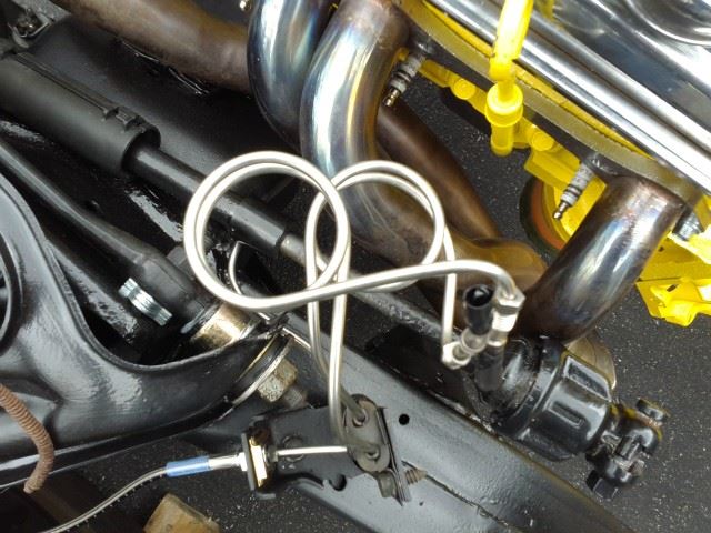 Front brake lines are both ready to connect to the proportioning valve.
