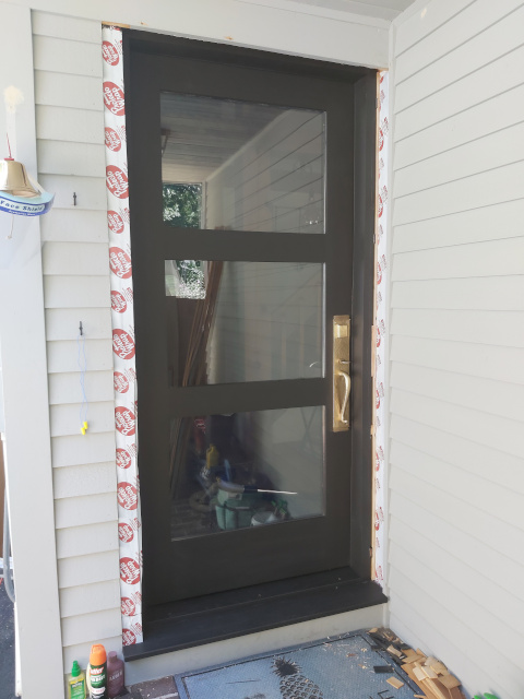 New Front Door Hung and Sealed